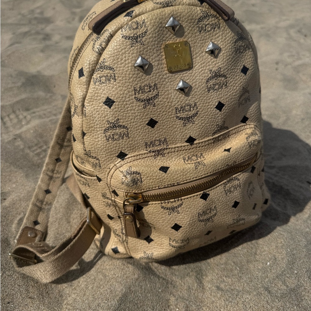 ❌❌❌ SOLD ❌❌❌ 
MCM Beige Logo-Print Mini Backpack with Gold Hardware